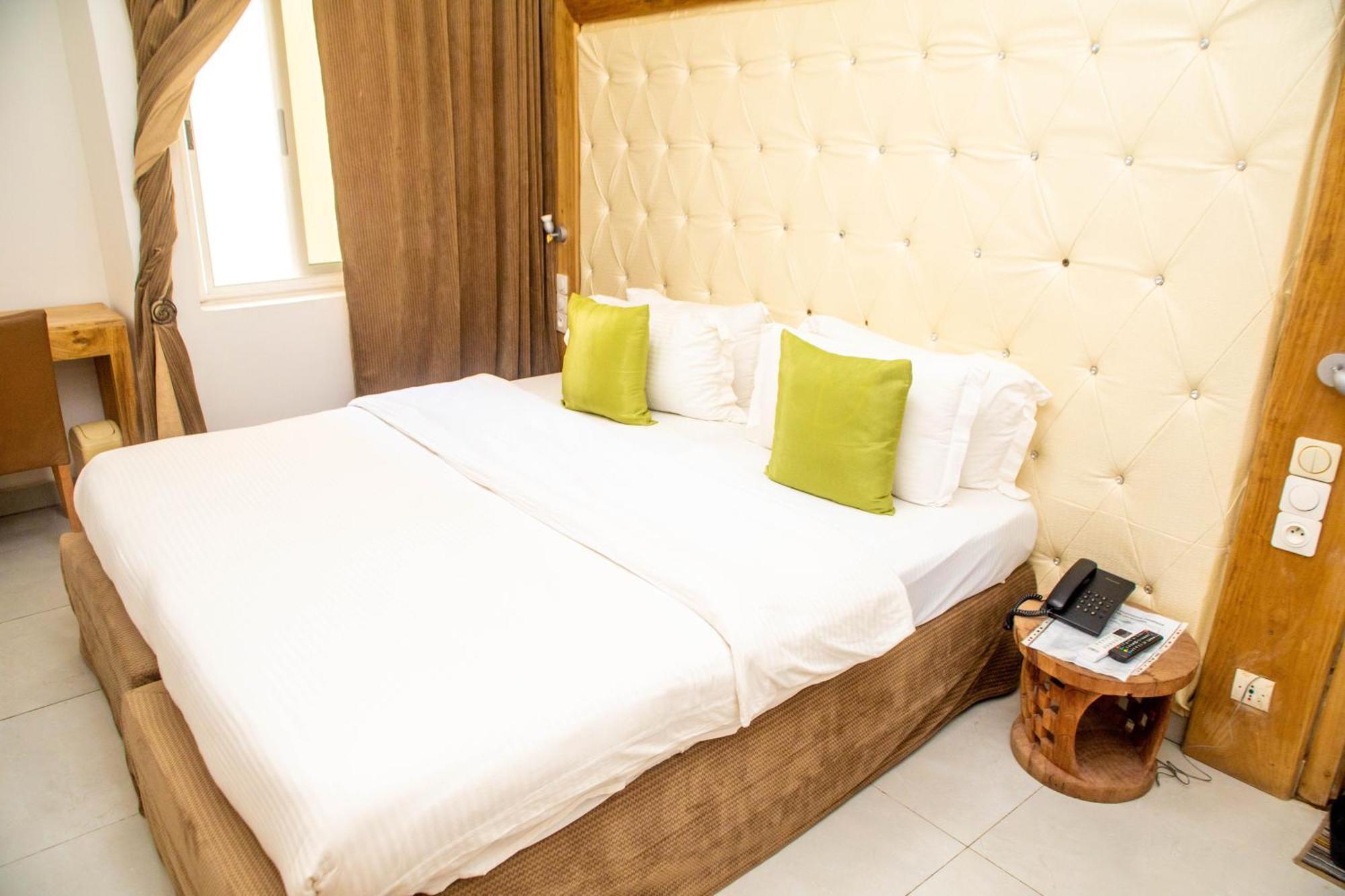 Hotel Les Orchidees Котону Номер фото