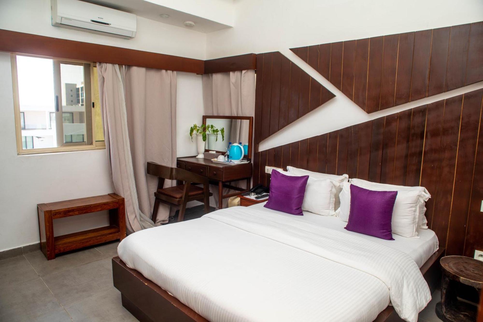Hotel Les Orchidees Котону Номер фото