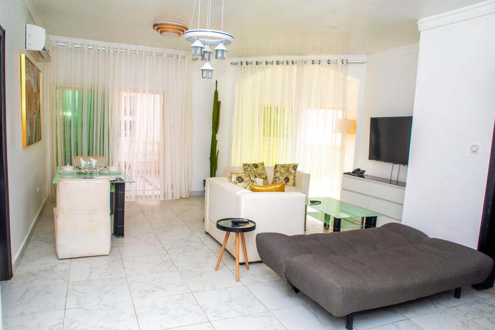 Hotel Les Orchidees Котону Экстерьер фото